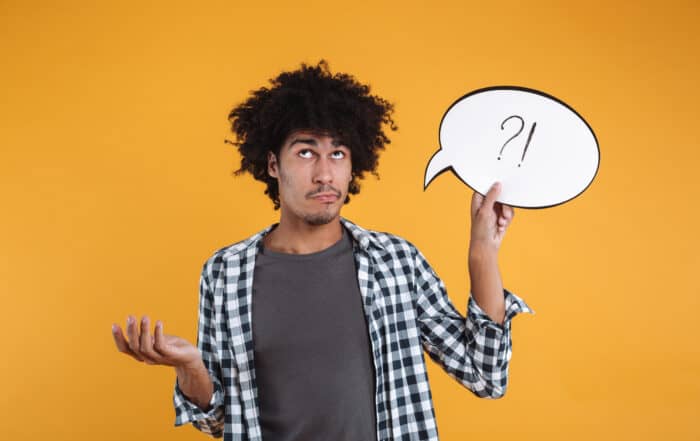 Portrait of a confused african man licensed money lender