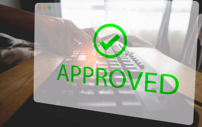 Asian woman hand tapping enter button for approving requests at home. Black old keyboard and visualized transparent virtual window displaying approval status. Conceptual of business at home. Avis Credit: Documents Needed for an Urgent Loan in Singapore