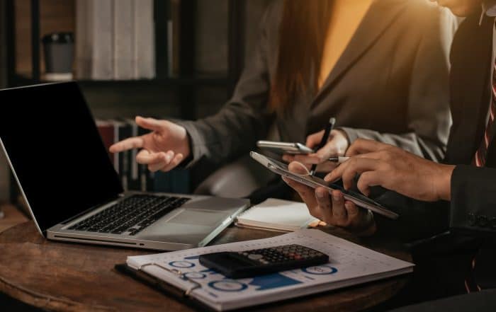 Businessman and partner using tablet and calculator for calculat A Comprehensive Guide by Avis Credit