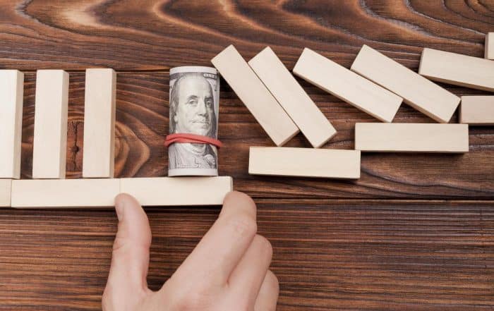 saving-economy-stopping-crisis-concept Avis Credit: Understanding Bridging Loans in Singapore