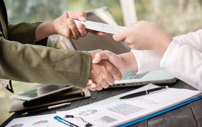 Business people shaking hands finishing up meeting businessman two people shaking hands finishing up a meeting