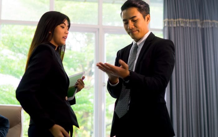 colleagues-standing-office