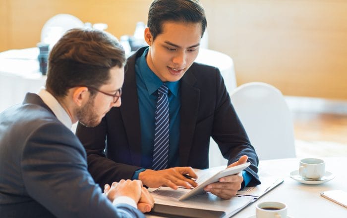 Two Content Business Partners Discussing Issue