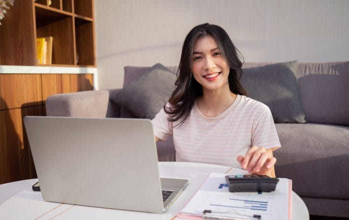 Image of young Asian woman at home